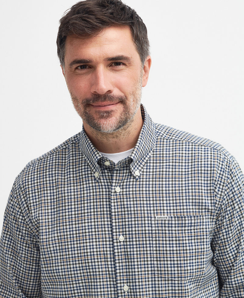 An image of a male model wearing the Barbour Durand Regular Long-Sleeved Shirt in the colour Olive.