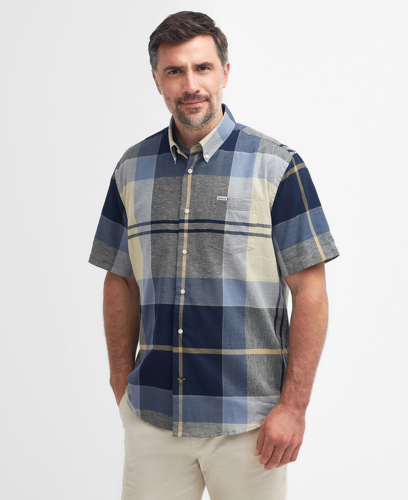 An image of a male model wearing the Barbour Douglas Regular Short-Sleeved Shirt in the colour River Birch.