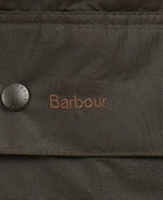 An image of the Barbour Classic Beaufort Wax Jacket in the colour Olive.