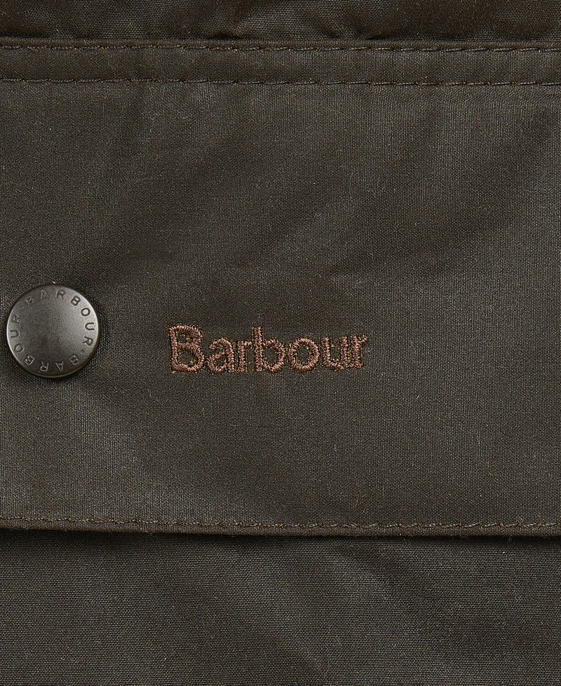 An image of the Barbour Classic Beaufort Wax Jacket in the colour Olive.
