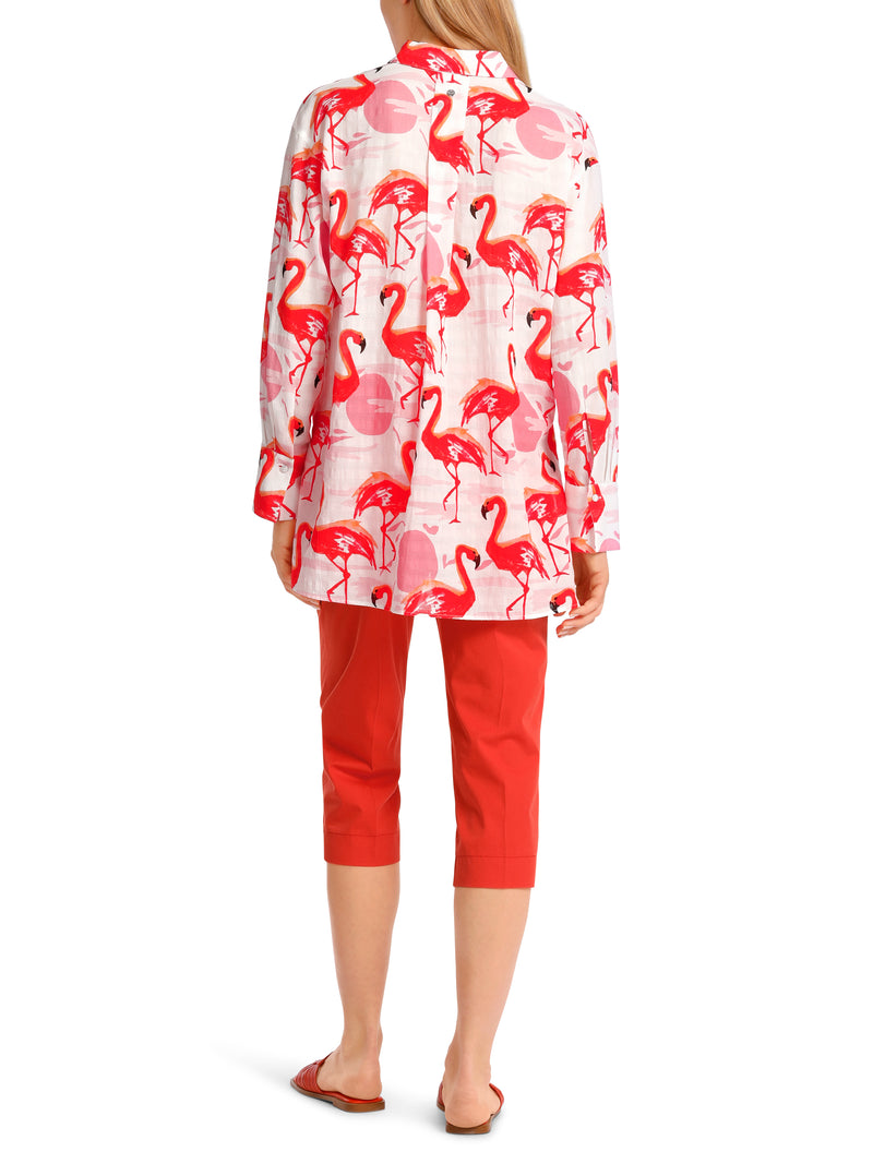 Marc Cain Flamingo Long Sleeve Blouse. A long sleeve blouse with Kent collar, button placket and pink flamingo print.