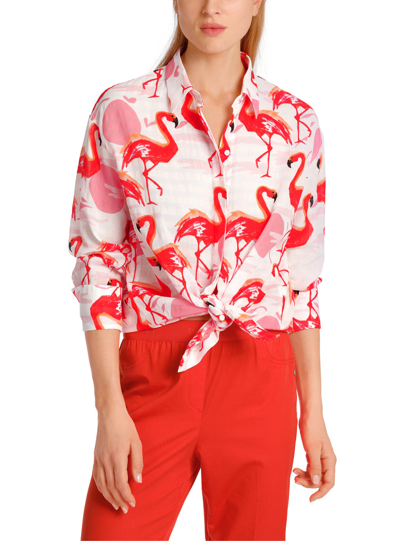 Marc Cain Flamingo Long Sleeve Blouse. A long sleeve blouse with Kent collar, button placket and pink flamingo print.