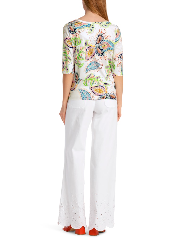 Marc Cain Pattern 3/4 Sleeve Top. A slim fit top with round neckline, 3/4 length sleeves and multicoloured floral motif.