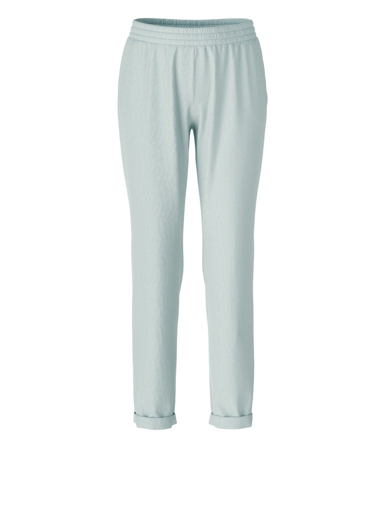 Marc Cain Roanne Trousers. A relaxed fit trouser in slip-on style with jogging waistband. These trousers are in the pale blue colour smoky ice.