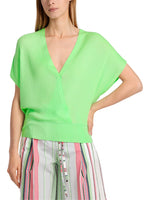 Marc Cain Short Sleeve Wrap Top. An oversized fit top with short sleeves and wrap design. The material is rib nit in a vibrant green colour.