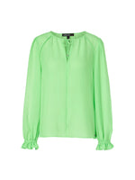 Marc Cain Blouse. An A-line blouse with long ham sleeves and tie neck detail. This blouse is light and airy and the colour is vibrant green.