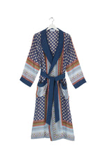 One Hundred Stars Gown. A long kimono-style gown with an intricate indigo design.