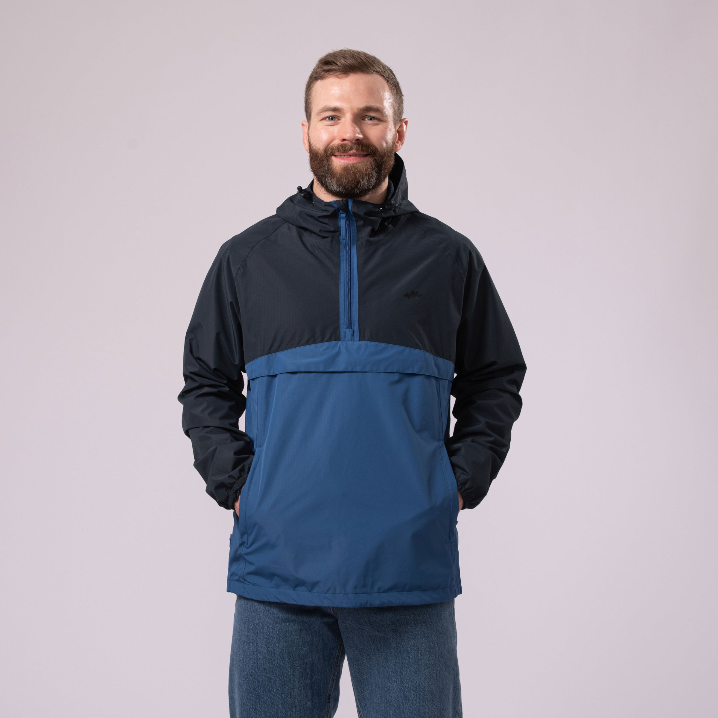 An image of the Mac in a Sac Nomad Kagoul