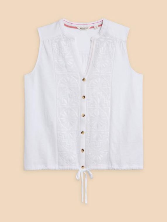 White Stuff Tulip Jersey Sleeveless Shirt. A button-up shirt with a tie hem and feminine intricate embroidery detail