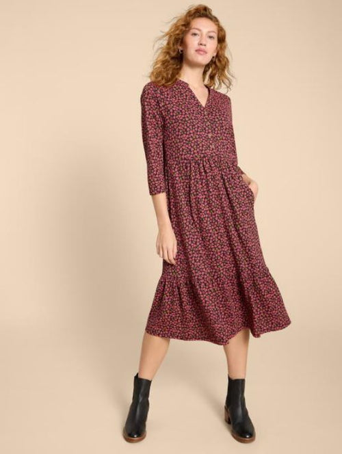 White Stuff Naya Jersey Dress. A midi length dress with 3/4 length sleeves, button placket and a pretty pink hearts design.