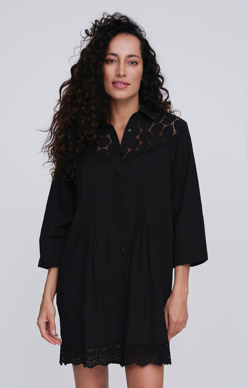 Pia Rossini Reeva Beach Shirt. A relaxed fit shirt with rolled cuff sleeves, in lightweight black material.