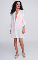 Pia Rossini Reeva Beach Shirt. A relaxed fit shirt with rolled cuff sleeves, in lightweight white material.