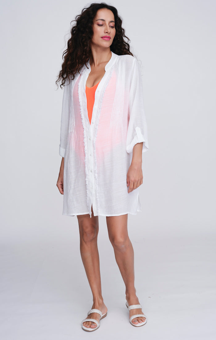 Pia Rossini Reeva Beach Shirt. A relaxed fit shirt with rolled cuff sleeves, in lightweight white material.