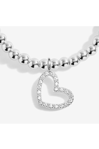 An image of the Joma Jewellery Christmas A Little 'Merry Christmas Super Sister' Bracelet