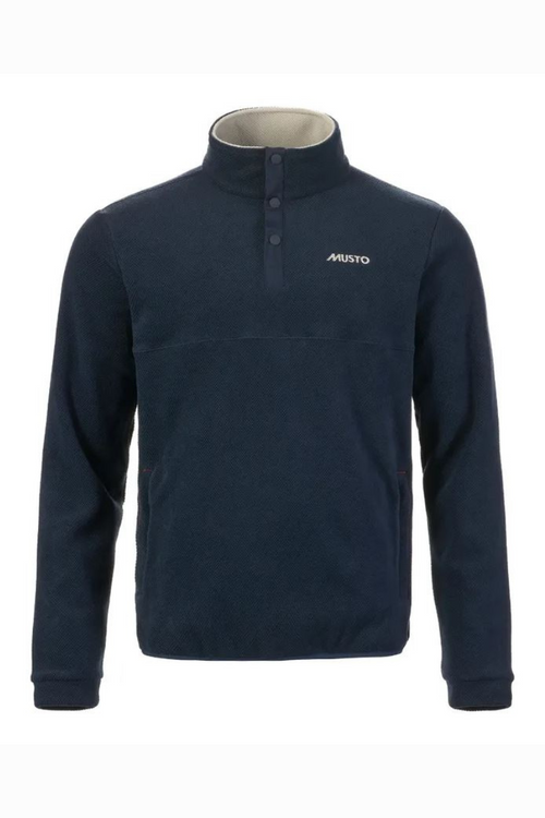 Musto Classic Fleece Pullover. A pullover fleece with collar buttons, contrast interior lining and embroidered Musto branding, in the colour navy.