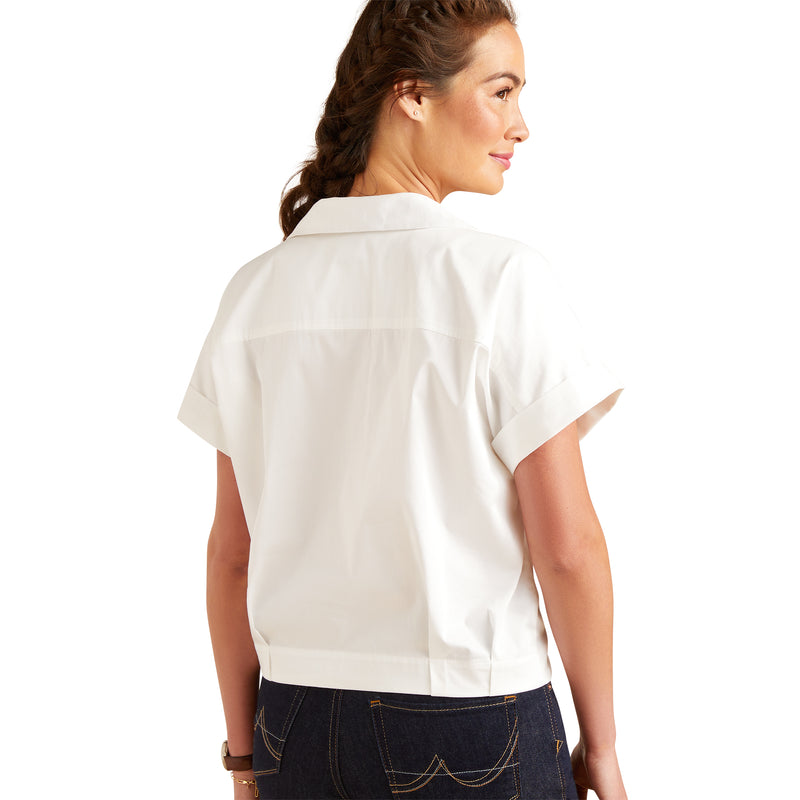 An image of a female model wearing the Brookside Shirt in the colour White.