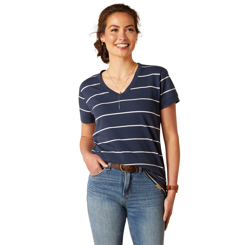 An image of a female model wearing the Ariat Fairford T-Shirt in the colour Navy/White.