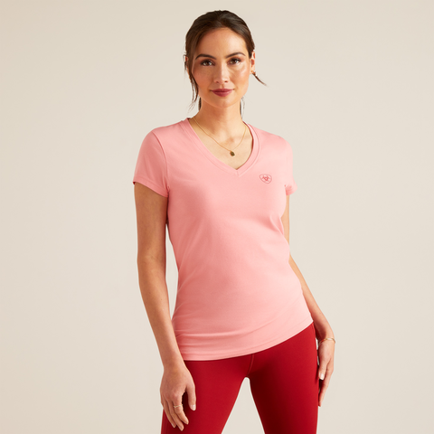 An image of a model wearing the Ariat Petal Font T-Shirt in the colour Flamingo Plume.