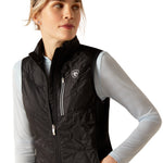An image of a female model wearing the Ariat Fusion Insulated Gilet in the colour Black