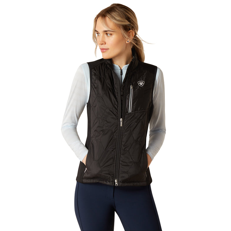 An image of a female model wearing the Ariat Fusion Insulated Gilet in the colour Black.