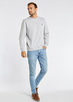 Dubarry Spencer Sweatshirt. A regular fit grey sweatshirt with long sleeves, crew neck and logo embroidery.