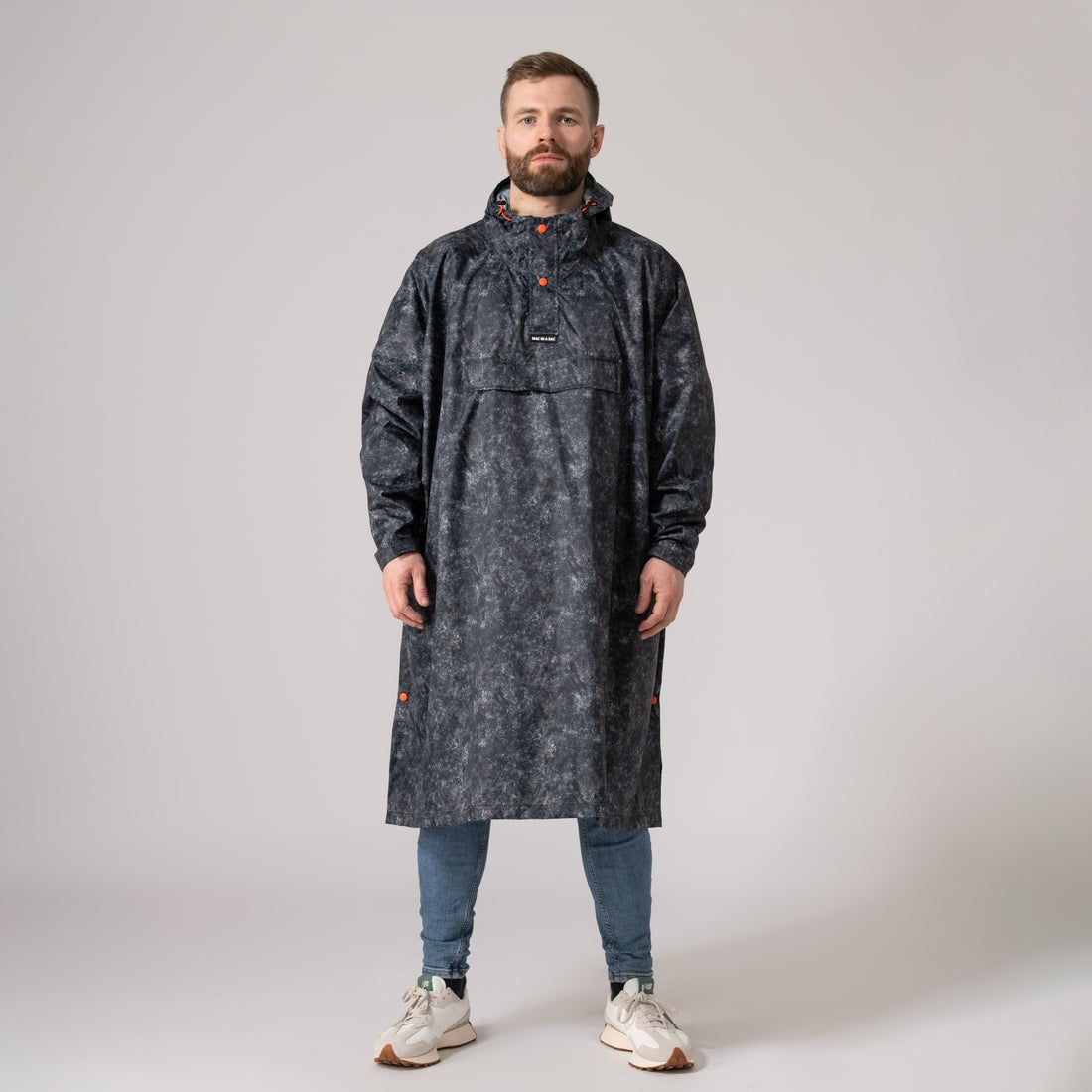 An image of the Mac in a Sac Festival Poncho