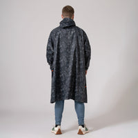 An image of the Mac in a Sac Festival Poncho