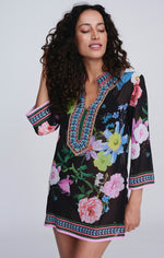 Pia Rossini Samba Cover Up. A mid-length, 3/4 length sleeve cover up with V-neck and embellishment in a black and multicoloured floral print.