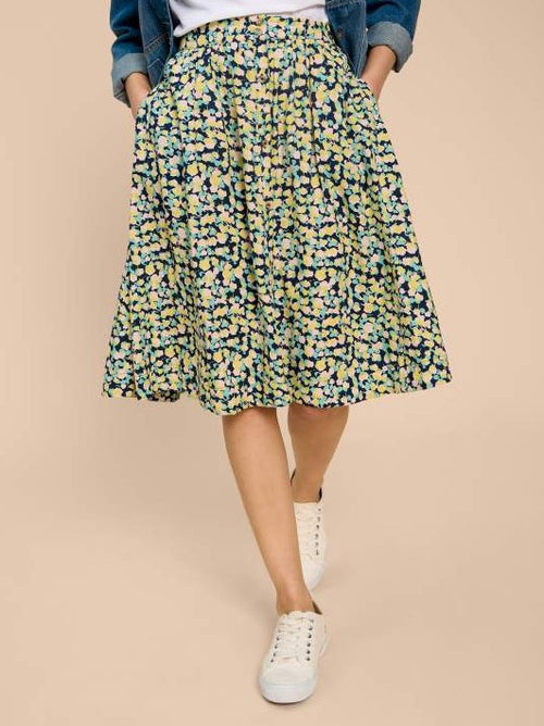 White Stuff Sarah Knee Skirt. A knee length skirt with button-down detail and pockets, in a multi-coloured print.