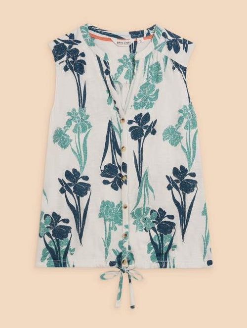 White Stuff Tulip Jersey Sleeveless Shirt. A regular fit, sleeveless shirt with notch neck, tie hem, and floral patterned embroidery in shades of blue.
