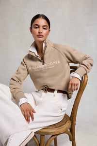 An image of the Holland Cooper Sporting Goods Zip Henley