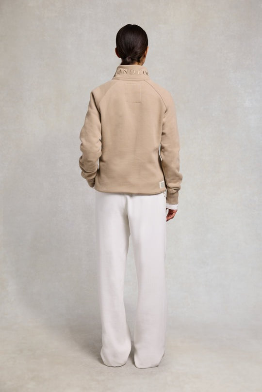 An image of the Holland Cooper Sporting Goods Zip Henley