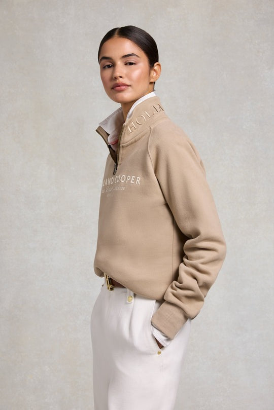 An image of the Holland Cooper Sporting Goods Zip Henley