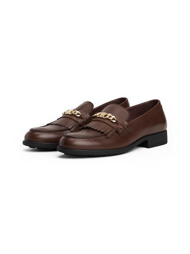 An image of the Tommy Hilfiger Leather TH Monogram Chain Loafers