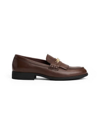 An image of the Tommy Hilfiger Leather TH Monogram Chain Loafers