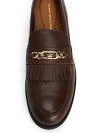 An image of the Tommy Hilfiger Leather TH Monogram Chain Loafers