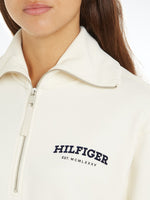 An image of the Hilfiger Monotype Flock Logo Half-Zip Sweatshirt by Tommy Hilfiger in the colour Calico.