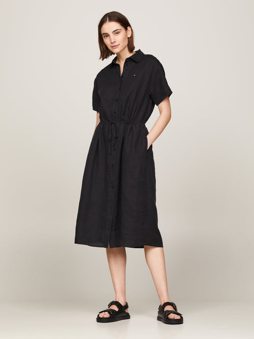 Tommy Hilfiger Midi Shirt Dress. A relaxed fit dress with short sleeves, collar, button fastenings, and logo embroidery. Black.