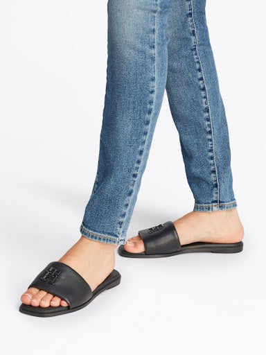 An image of the Tommy Hilfiger TH Logo Hardware Leather Mules