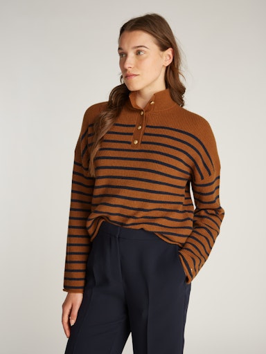 An image of the Tommy Hilfiger Gold Button Polo Sweater