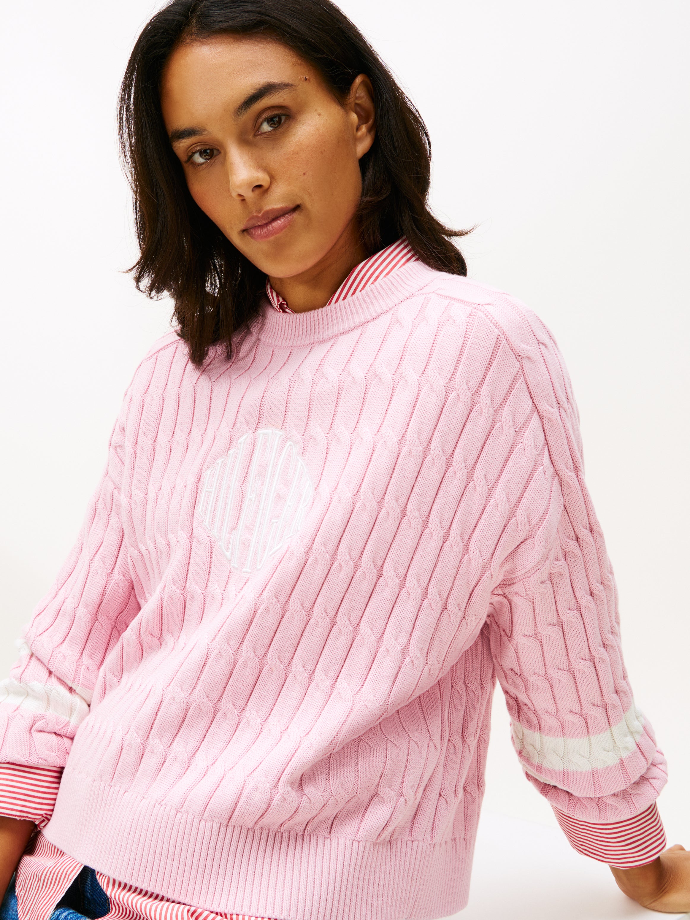 An image of the Tommy Hilfiger Logo Embroidery Relaxed Cable Knit Jumper