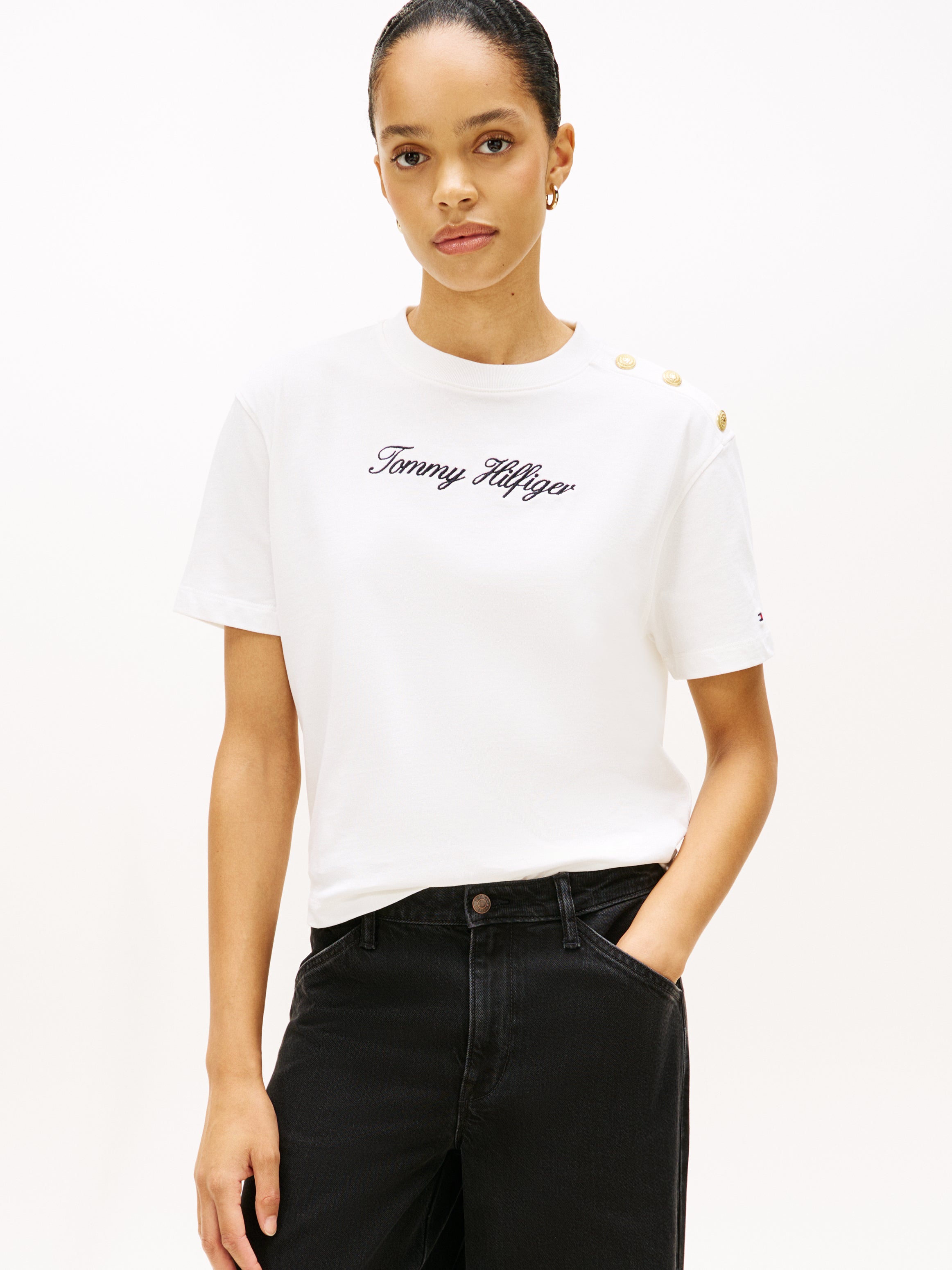 An image of the Tommy Hilfiger Gold Button Script Mdrn SS Tee