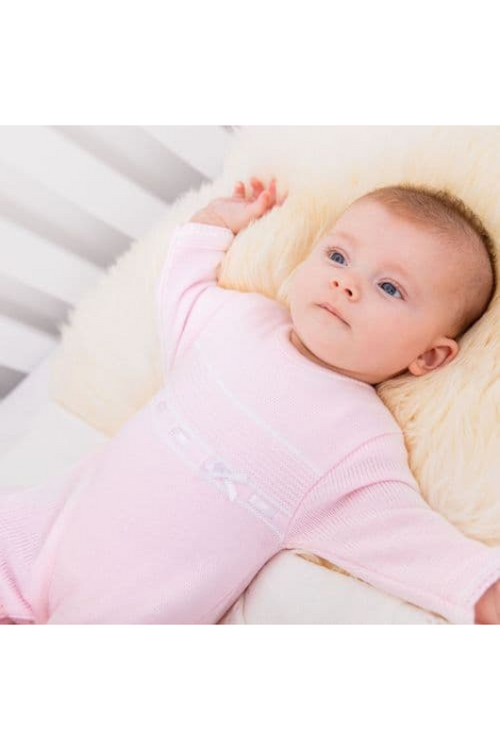 An image of the Dandelion Knitted Onesie