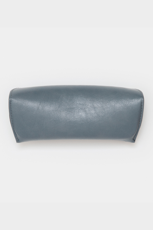 GLAS Vegan Leather Case. A vegan leather glasses case with button closure in the shade dusty blue.