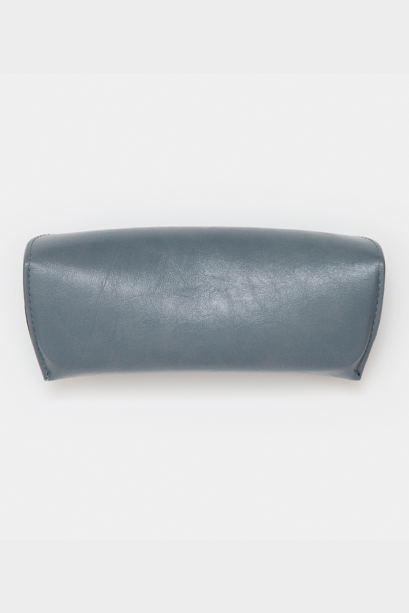 GLAS Vegan Leather Case. A vegan leather glasses case with button closure in the shade dusty blue.