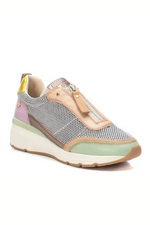 Carmela Trainer. A shiny, multicoloured leather trainer with non-slip sole.