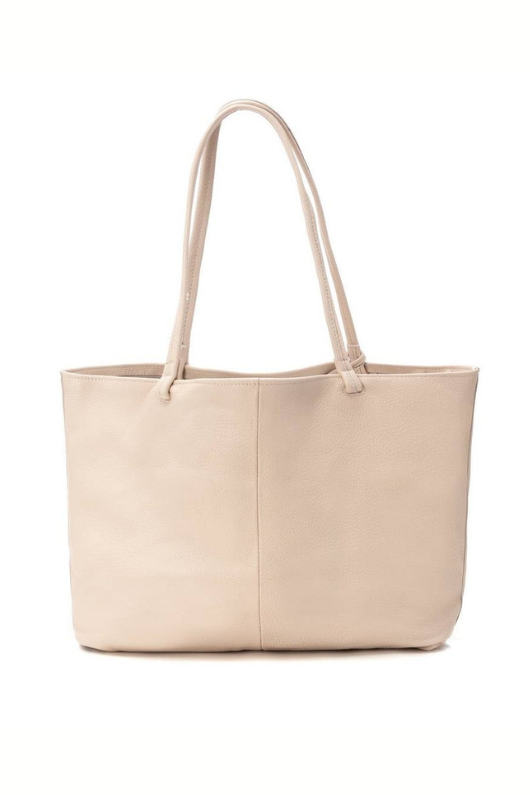 Carmela Handbag. A spacious beige leather shoulder bag with gold brand logo.