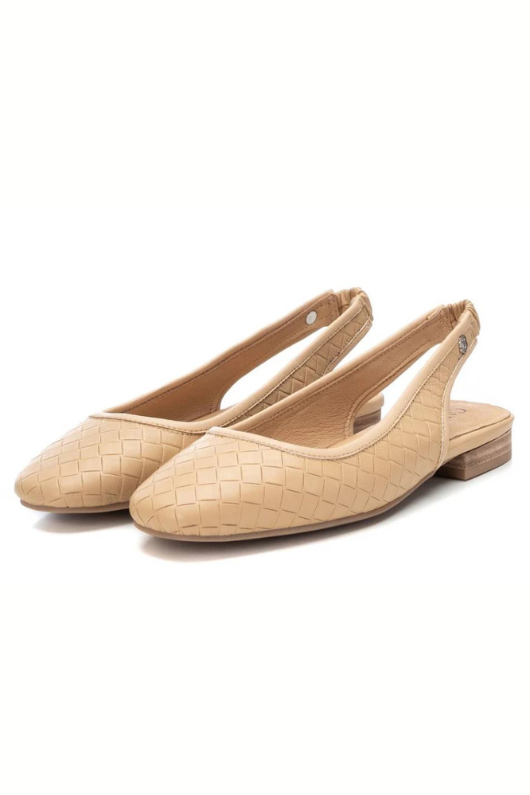 Carmela Flat Sandal. A pair of beige leather sandals with geometric design, non-slip sole, and sling back.