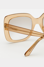 GLAS Mio Tinted Readers. A pair of translucent caramel coloured reading glasses with a retro style frame