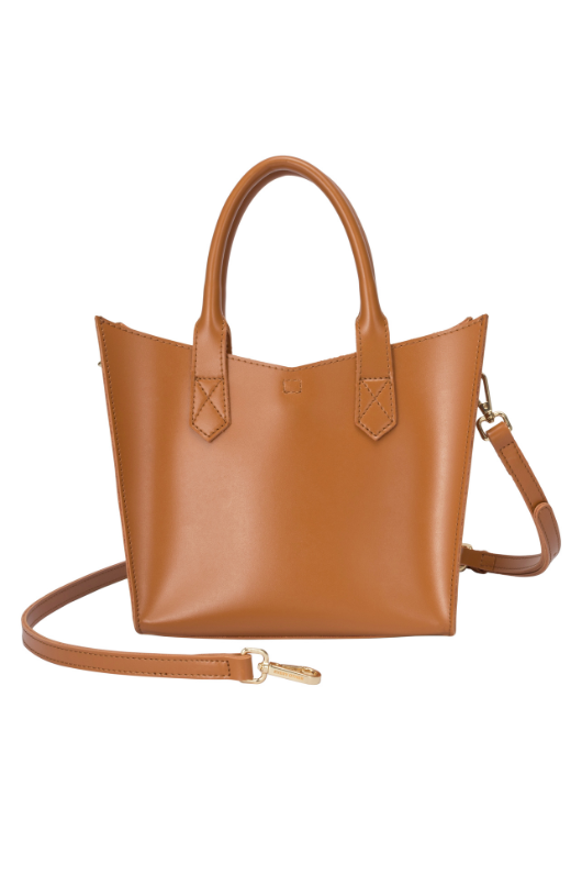 Every Other Twin Strap Grab Bag. A tan faux leather bag with top handles, crossbody strap and removable pouch.